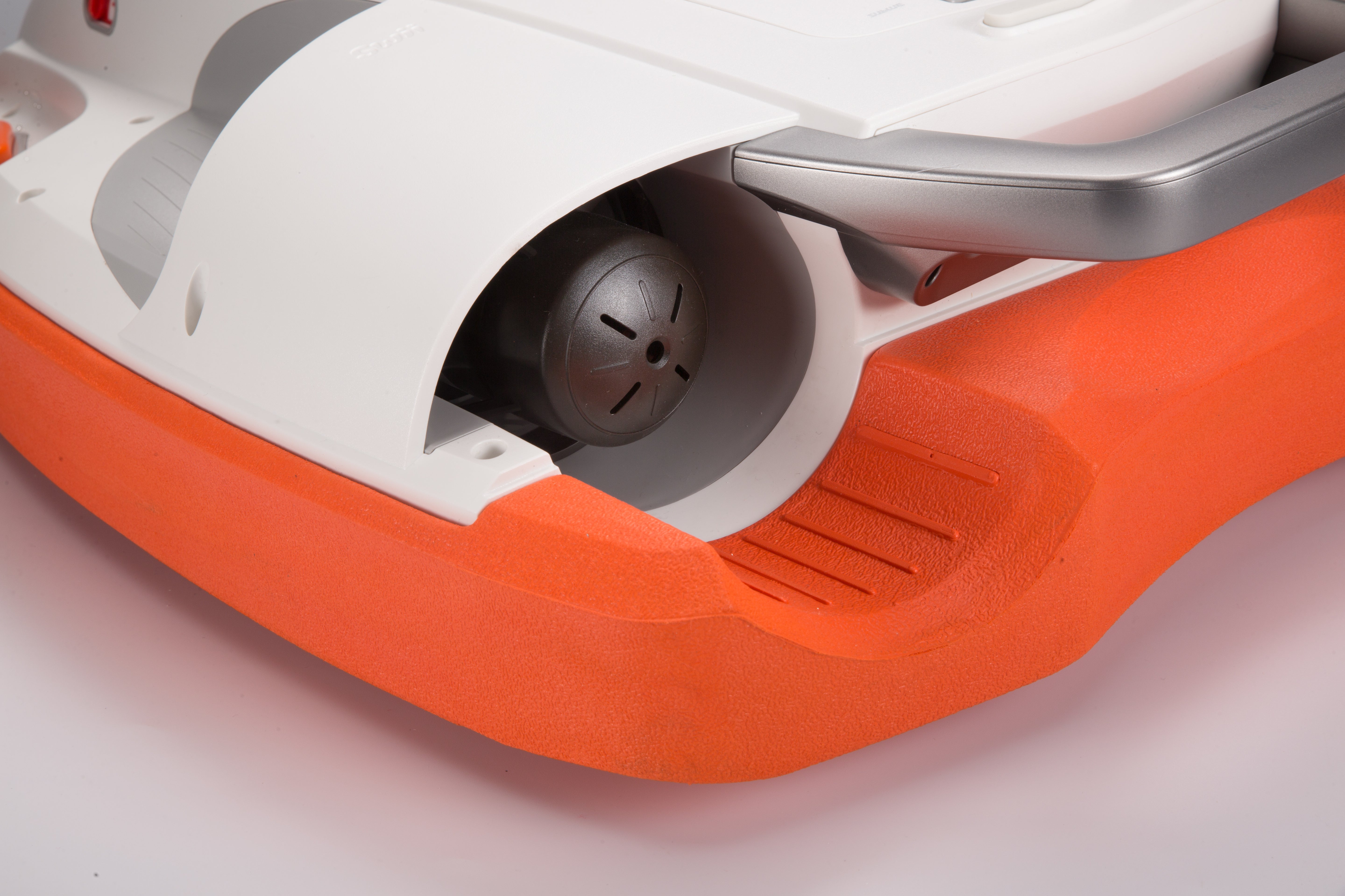 Close-up of orange textured surface and inner fan of SUBLUE Swii kickboard.